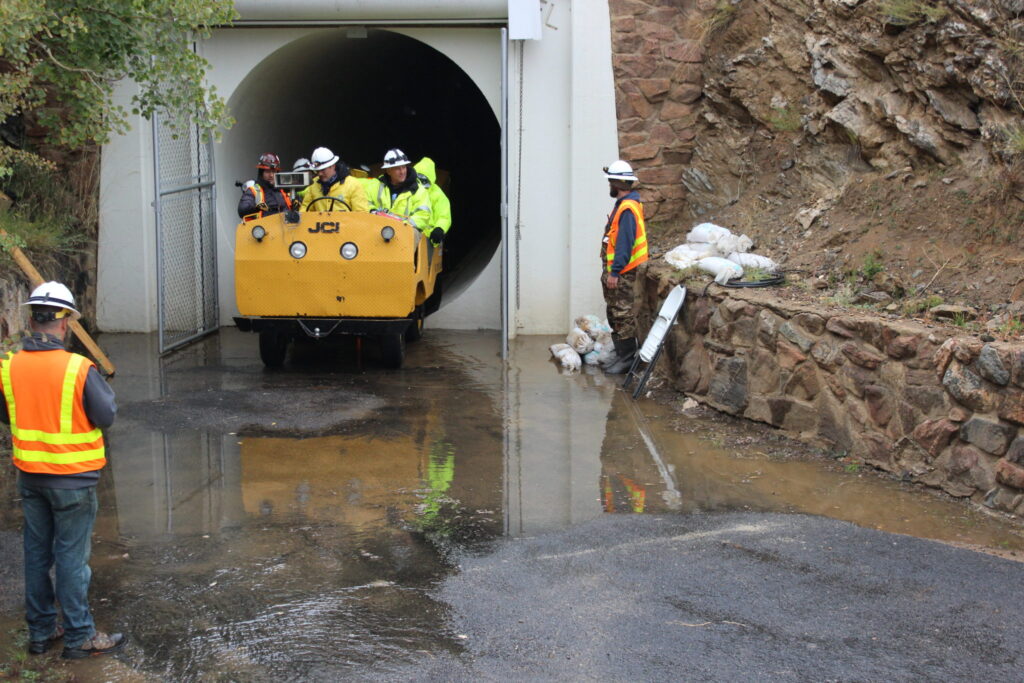 An inspection team leaving the 23-mile Roberts Tunnel east portal in Park County in 2016. The tunnel, which diverts water from the Blue River to the Front Range is inspected every five years. Photo credit: Denver Water