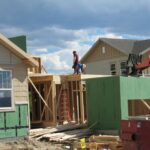 Construction workers build a single family home in Castle Rock. The community needs new surface water supplies to reduce its reliance on non-renewable groundwater. Credit: Jerd Smith