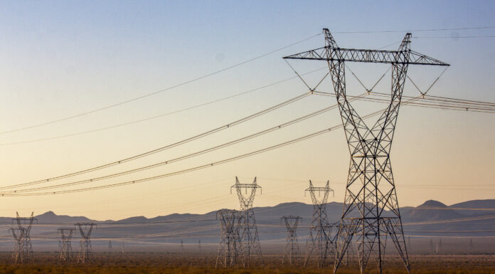 Transmission lines march outward from Hoover Dam, delivering the dam's hydroelectric power to cities, irrigation districts, and tribes across the Southwest.