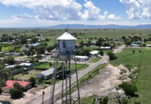 A New Mexico town is running dry. An immigration detention center is its biggest water customer.