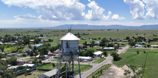 A New Mexico town is running dry. An immigration detention center is its biggest water customer.