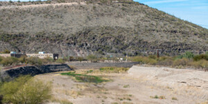 Once a ribbon of life flowing north from Mexico, the Santa Cruz River is now largely dry as it runs through Tucson, Arizona. ©Ted Wood Usage rights are granted for editorial and nonprofit purposes only. No commercial or re-sale rights are granted without permission of the photographer.