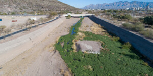 Once a ribbon of life flowing north from Mexico, the Santa Cruz River is now largely dry as it runs through Tucson, Arizona. ©Ted Wood Usage rights are granted for editorial and nonprofit purposes only. No commercial or re-sale rights are granted without permission of the photographer.