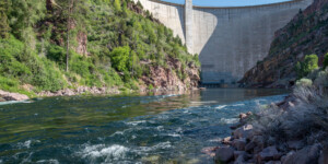 Flaming Gorge Reservoir stores water from the Green River in Wyoming, and is shared by Wyoming and Utah. The Green River leaves the dam at Dutch John, UT and joins the Colorado River south in Canyonlands NP.