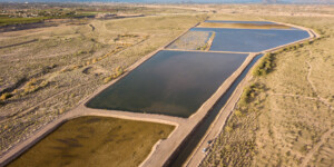 Excess water from the Salt and Verde rivers, Central Arizona Project water via the South Canal, and reclaimed water via pipeline from Mesa water reclamation facility is diverted to storage ponds (basins) at the Granite Reef Underground Storage Project. The project is a partnership between Phoenix and 5 other regional municipalities. It is owned and operated by Salt River Project (SRP).
Through artificial groundwater recharge, water is retained in huge, porous earthen basins and allowed to seep into the natural underground aquifer below. Water is stored in the aquifer and withdrawn by well-pumping when needed.
GRUSP and NAUSP enable Arizona to maximize the use of its Colorado River entitlement and help the state reach its "safe yield" goal. Safe yield is the equilibrium between the amount of groundwater pumped from an aquifer and the amount recharged into it.
It is permitted to recharge 93,000 acre-feet per year.