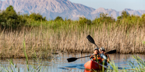 Francisco Zamora and Celia (SI botonist) kayak the waterways of Laguna Grande, the CO River Delta Restoration Project, MX