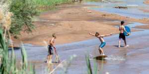 The Virgin River in St. George is so low that kids have turned it into a skim boarding park.