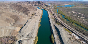 The All American Canal, the largest diversion on the Colorado River, passes through Winterhaven, CA on its way to the Imperial Valley. The Colorado River is seen flowing next to it.