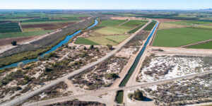 The All American Canal, the largest diversion on the Colorado River, passes through Winterhaven, CA on its way to the Imperial Valley. The Colorado River is seen flowing next to it.