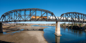 Below the Parker Dam a rail bridge crosses the CO River from Parker, AZ to California.