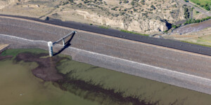 Aerial view of Cochiti Dam and Lake, along the Rio Grande in New Mexico, on June 25, 2024. Aerial support provided by LightHawk. ©Mitch Tobin Usage rights are granted for editorial and nonprofit purposes only. No commercial or re-sale rights are granted without permission of the photographer. https://waterdesk.org/multimedia/
